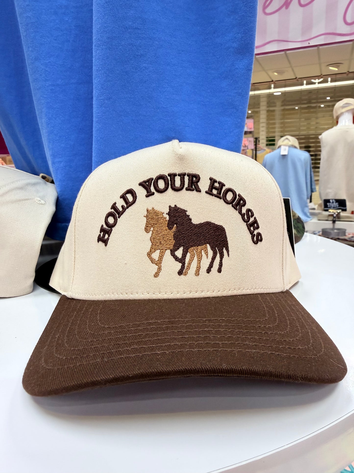 Hold your horses hat