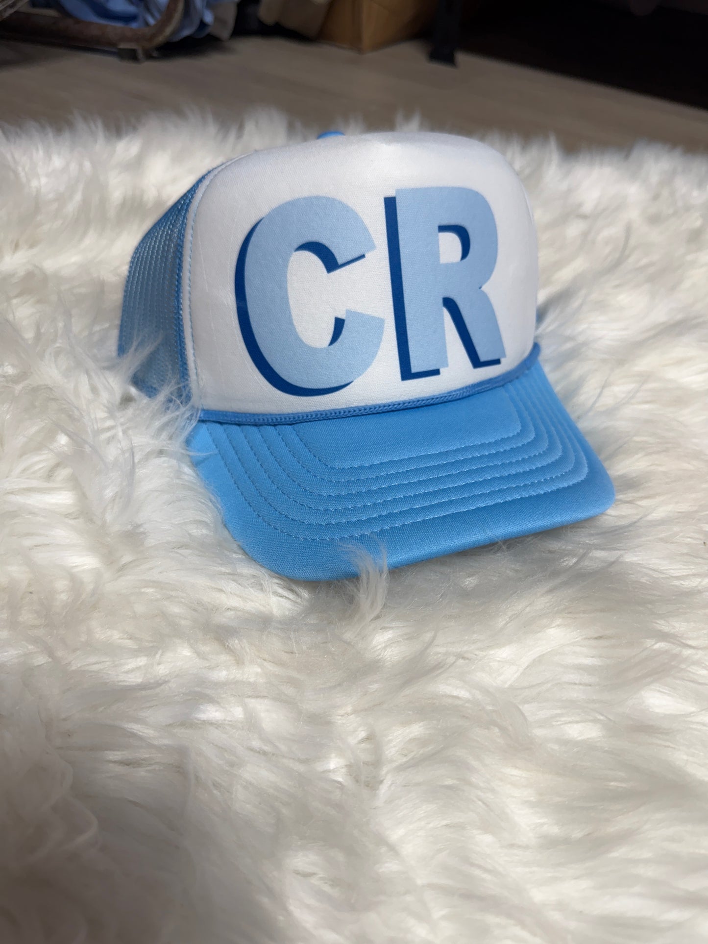 CR blue hat